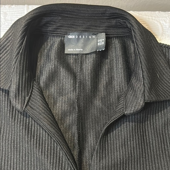 ASOS Black Jumpsuit with Wide-Leg Pants and V-Neck. Button front. Open back. 8 - Picture 7 of 12